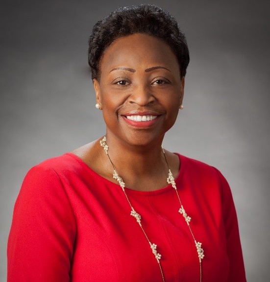 Portrait of Dr. Lillian Lowery in a red shirt.