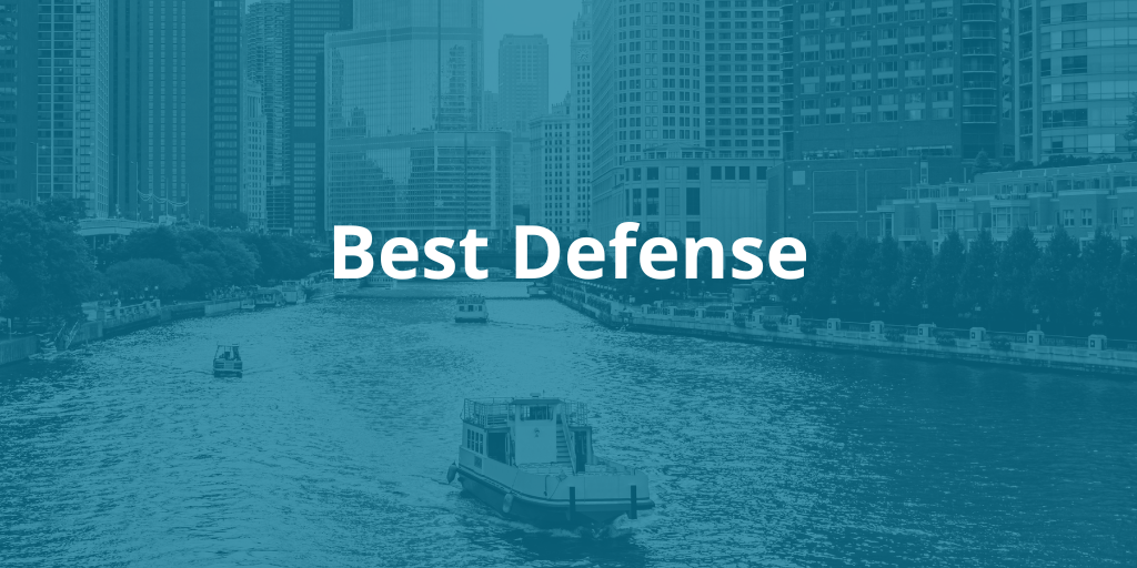 Skyline of Chicago with a blue overlay and the text "best defense"